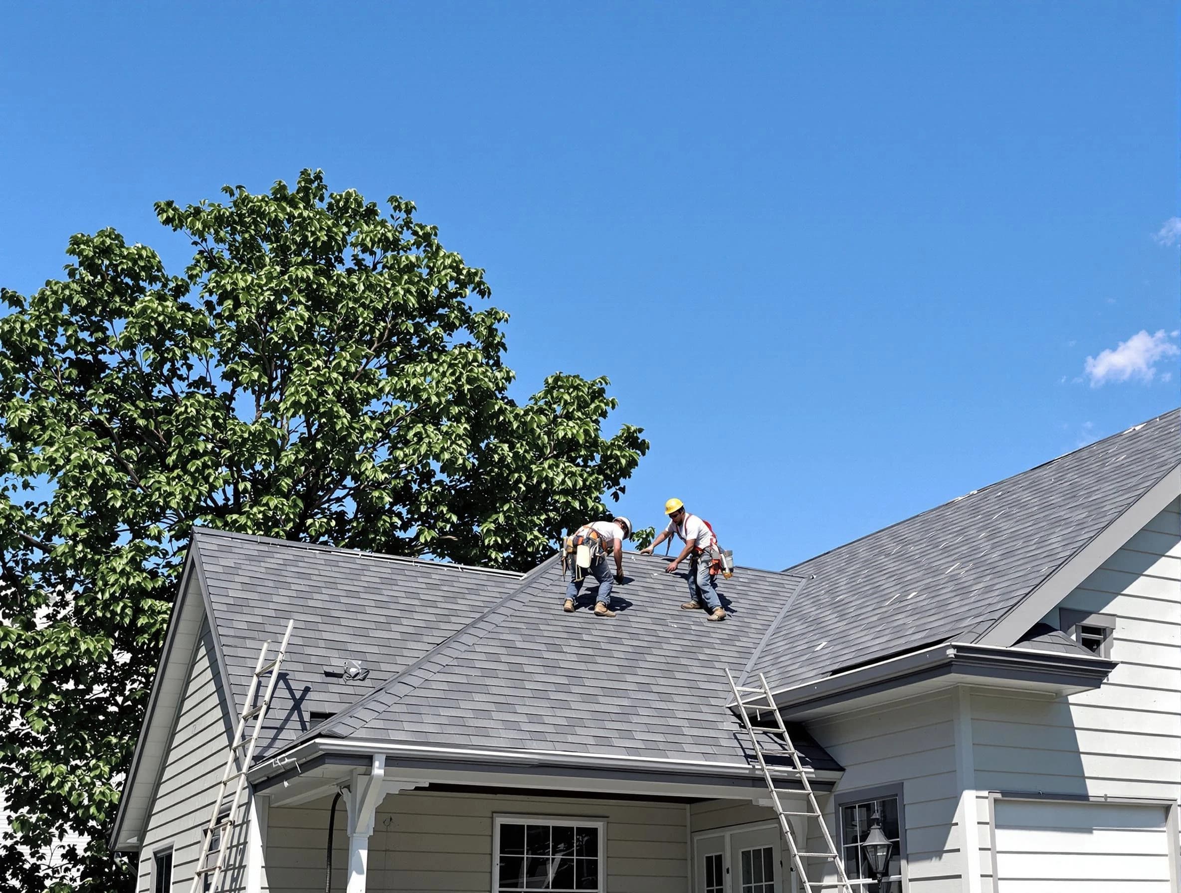 Bay Village Roofing Company crew finalizing a roof installation in Bay Village, OH