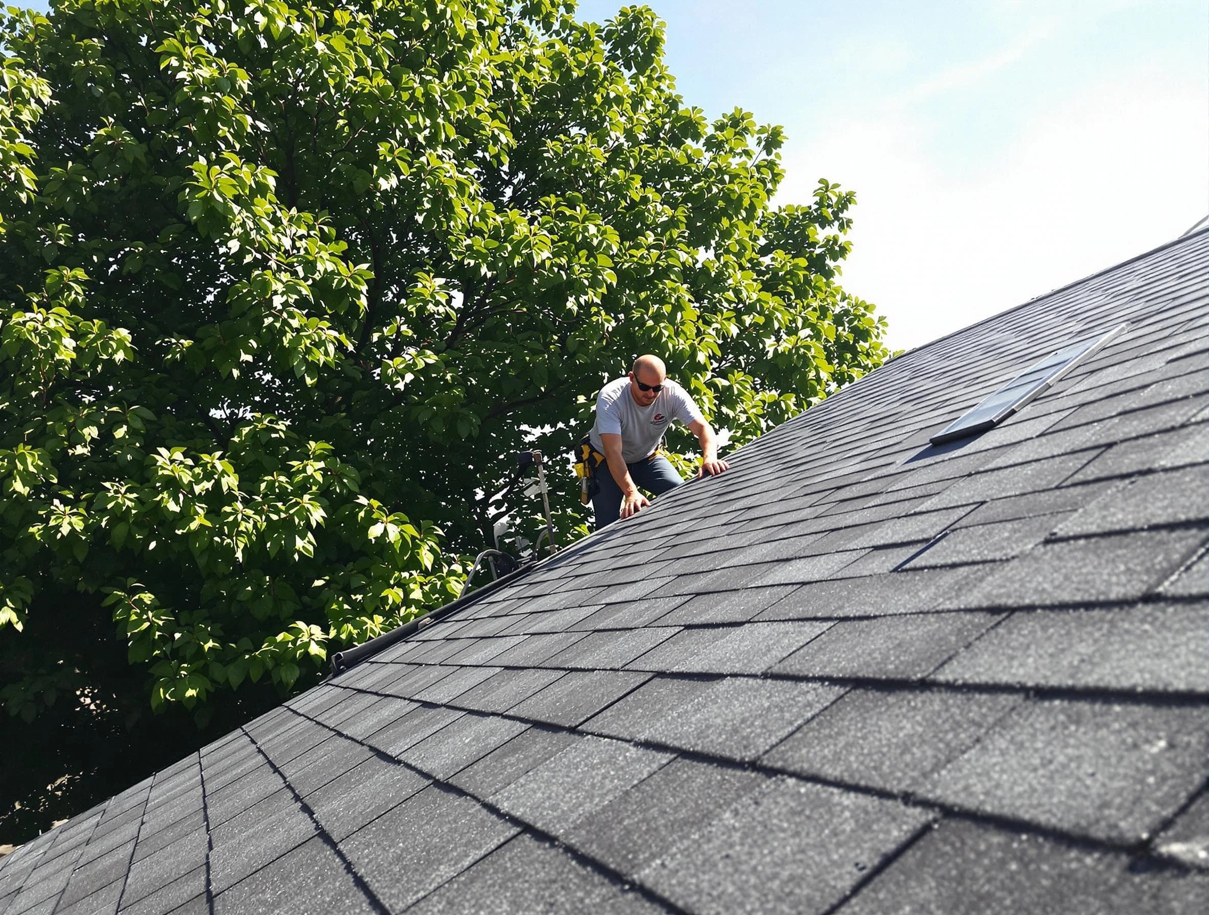 Certified roofers from Bay Village Roofing Company working in Bay Village, OH